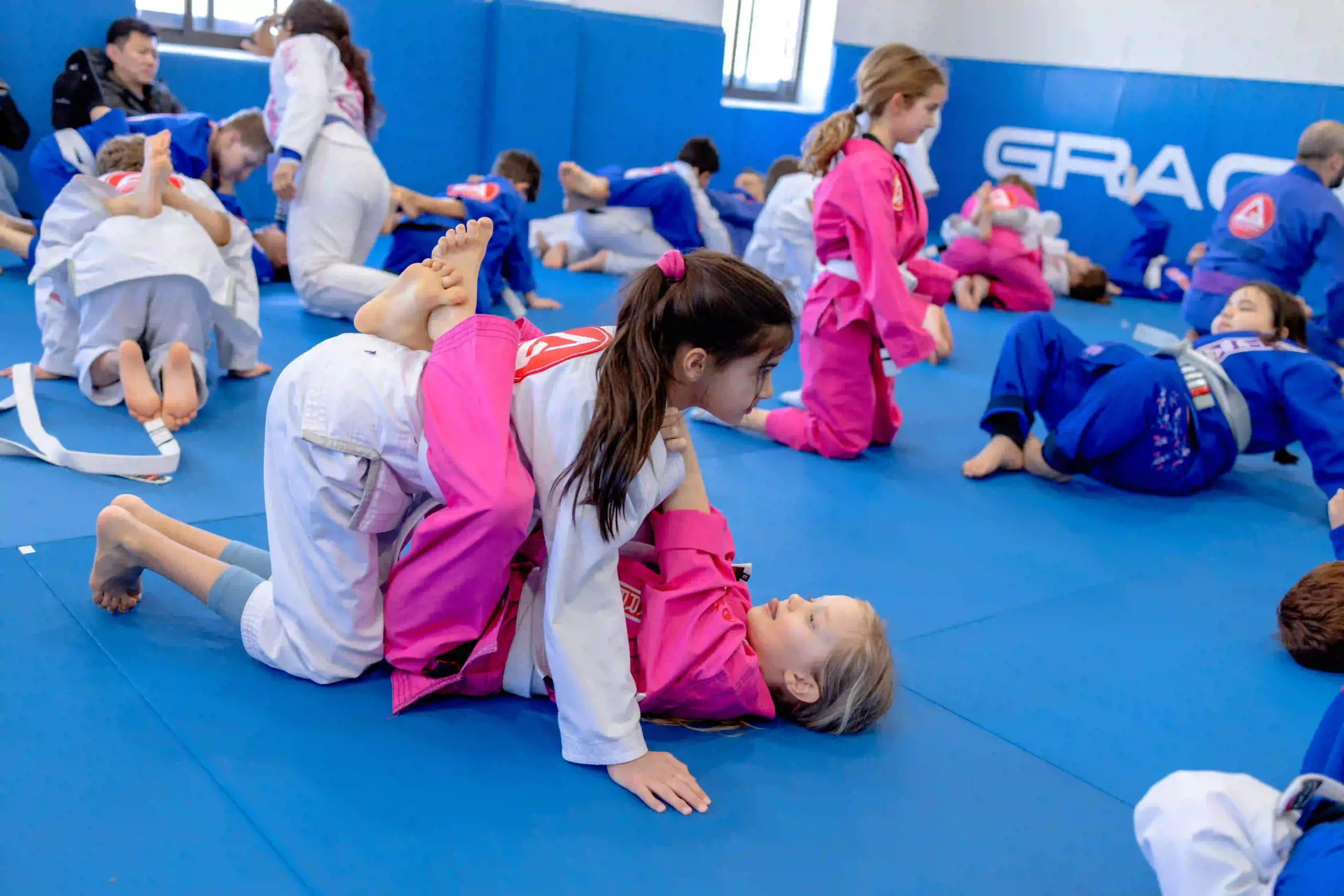 Kids training together on the mats at Gracie Barra Andover